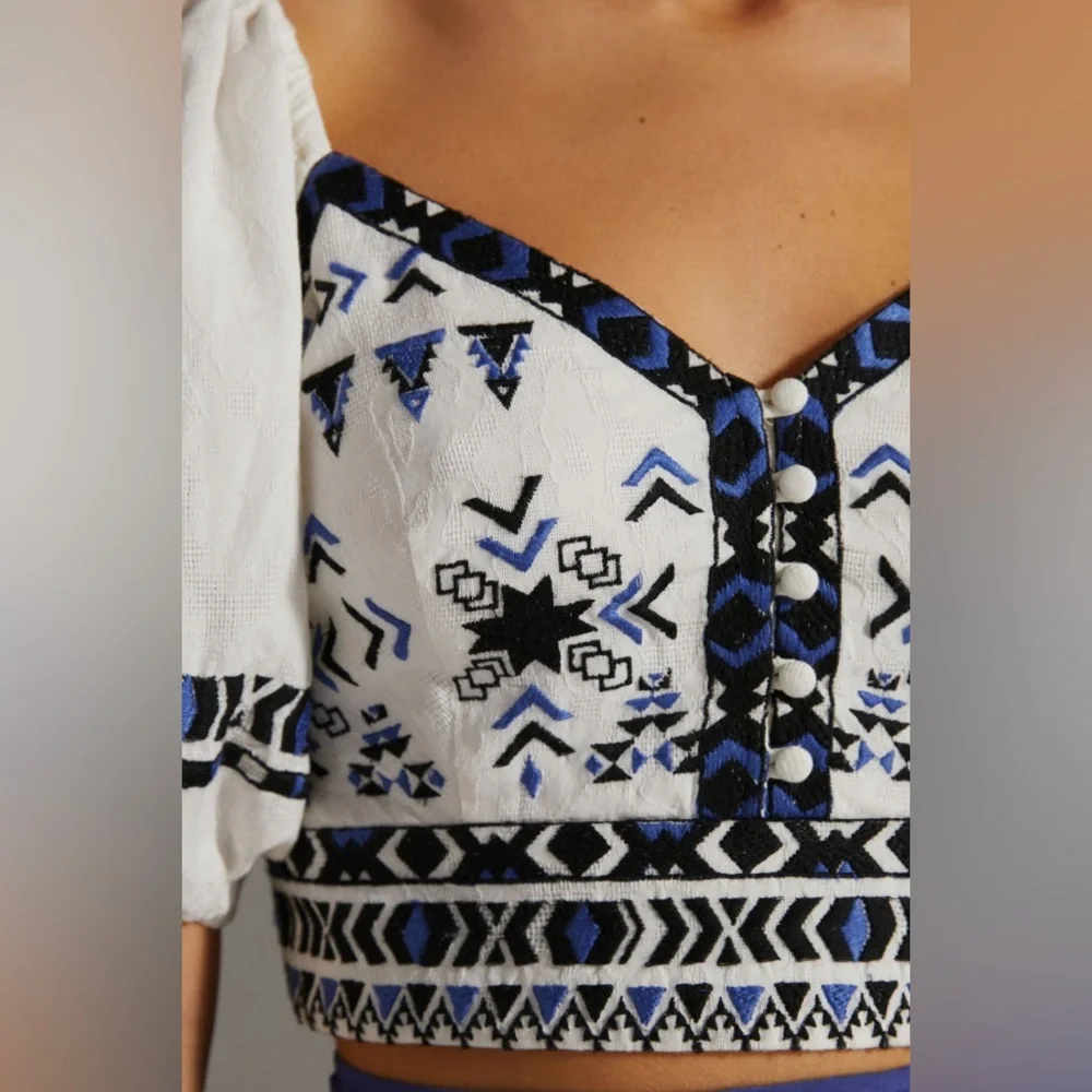 Anthropologie White Embroidered Cropped Peasant Top with Blue and Black Accents